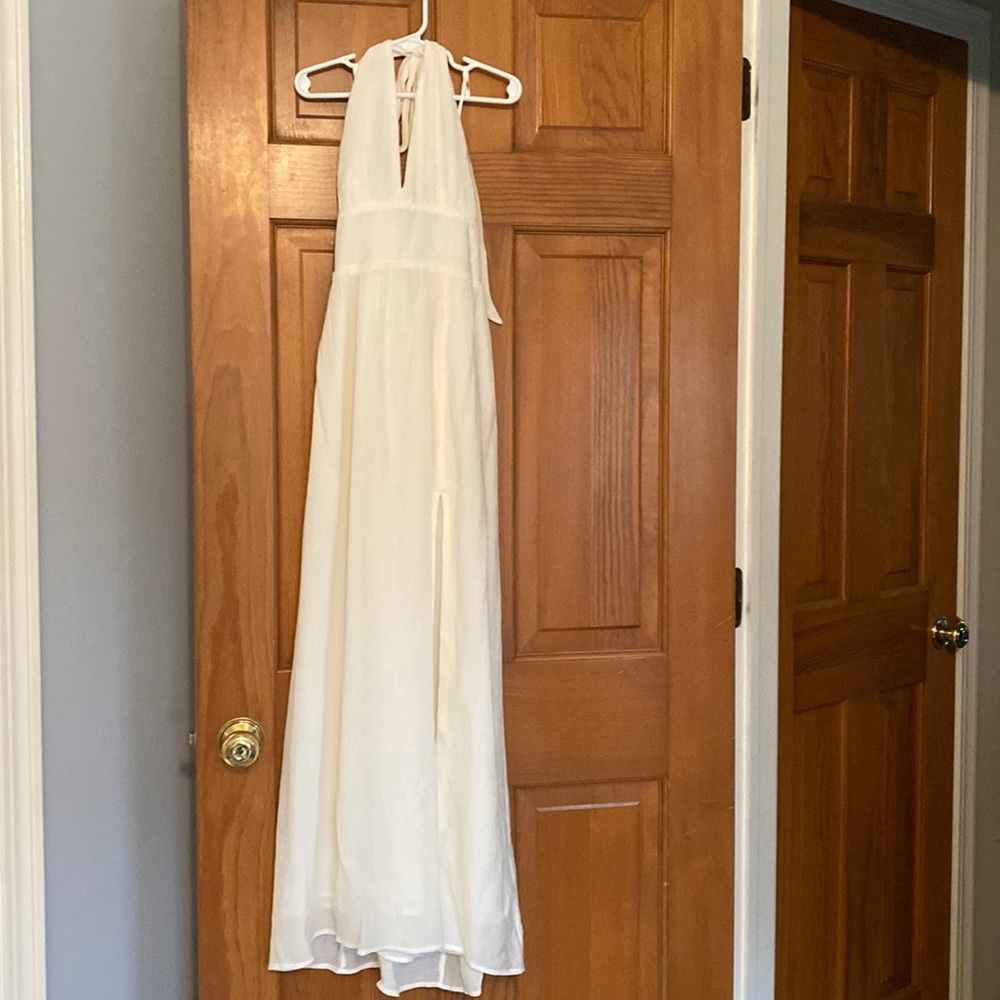 Flowing white halter dress